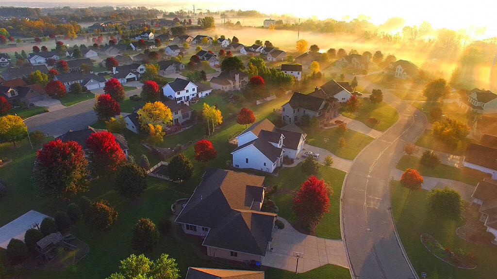 Magical sunrise over sleepy, foggy neighborhood